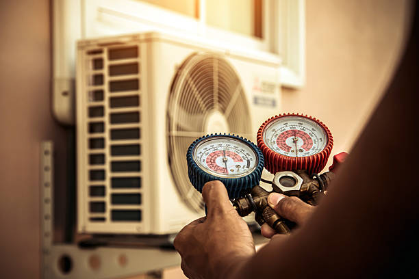 Professional Hvac technician working in Spencerville, MD